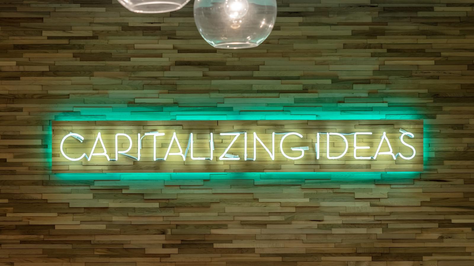 Capitalizing Ideas Sign - Vertical - Rice Alliance 