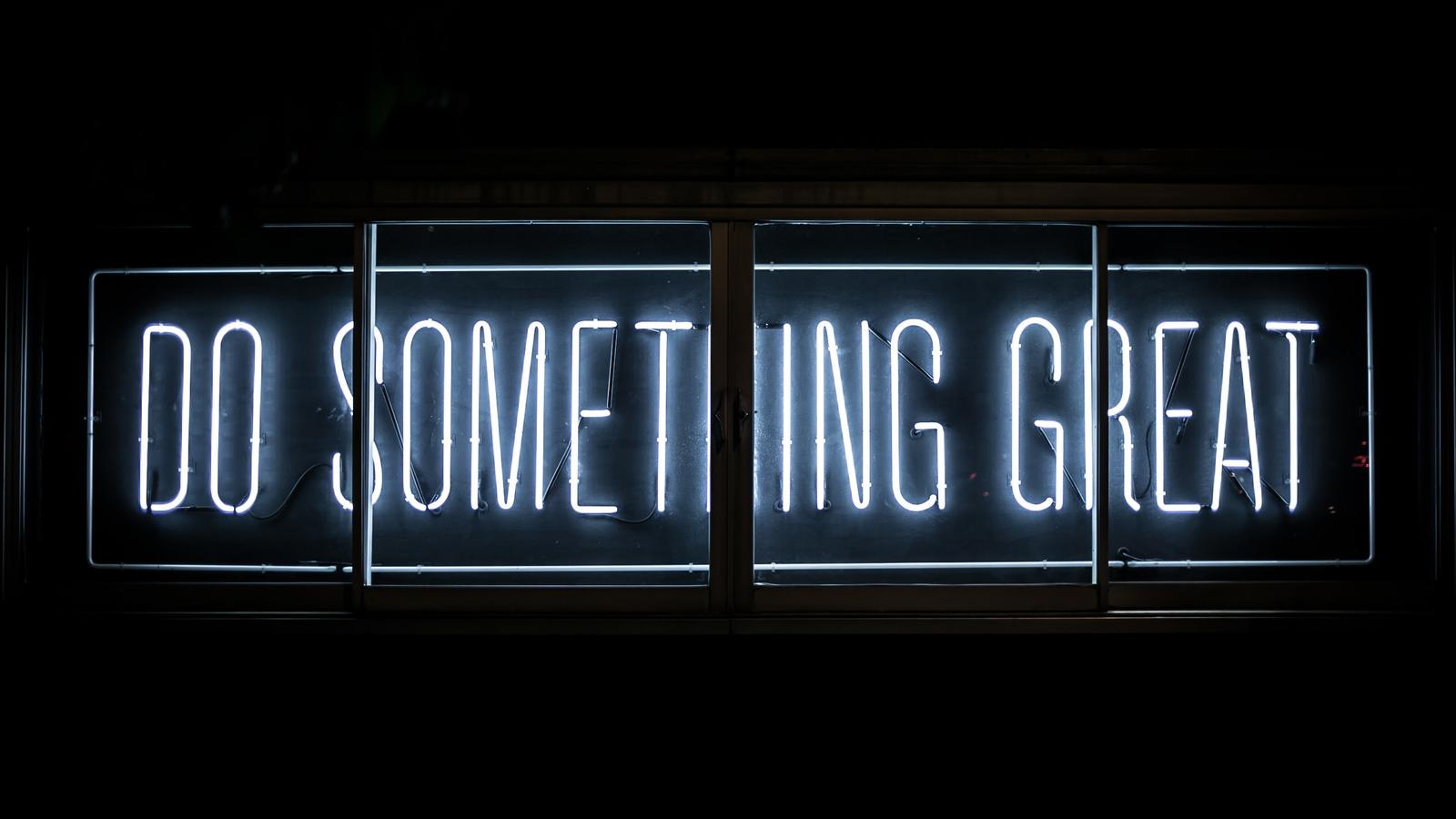 Neon sign that says do something great
